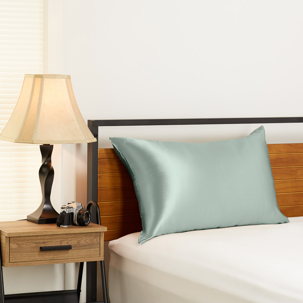Matcha Blissy silk pillowcase in a bedroom